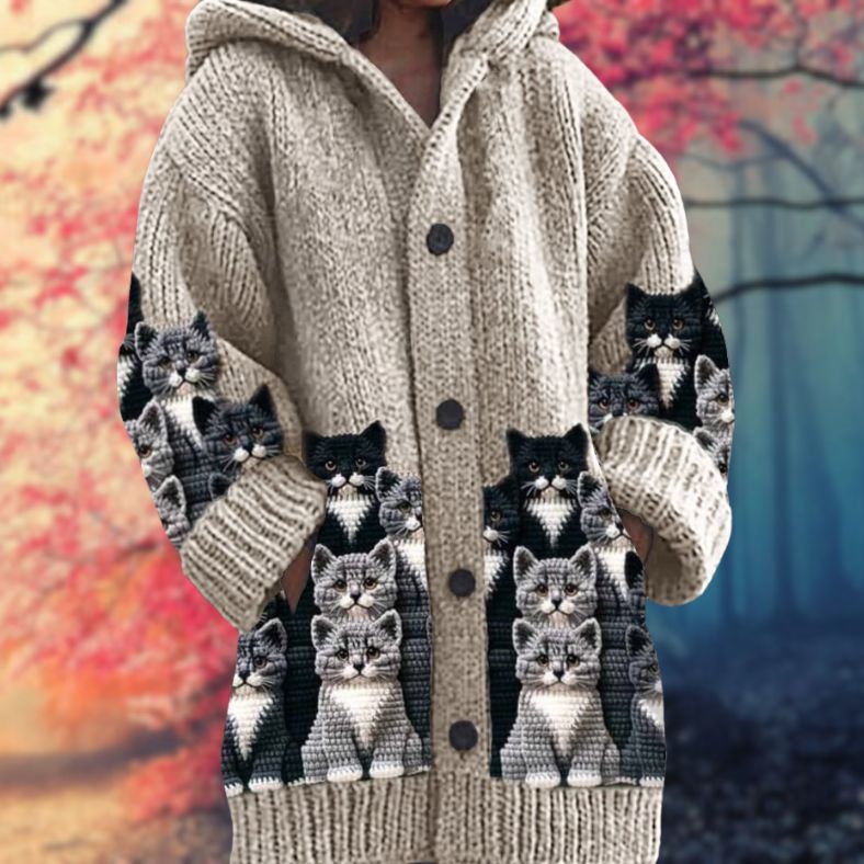 Annelie | Warm women's sweater with buttons and a hood.