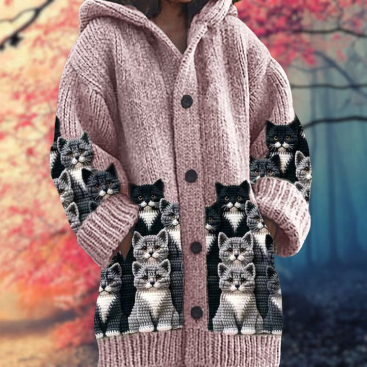 Annelie | Warm women's sweater with buttons and a hood.