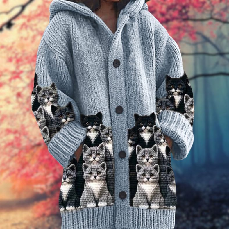 Annelie | Warm women's sweater with buttons and a hood.