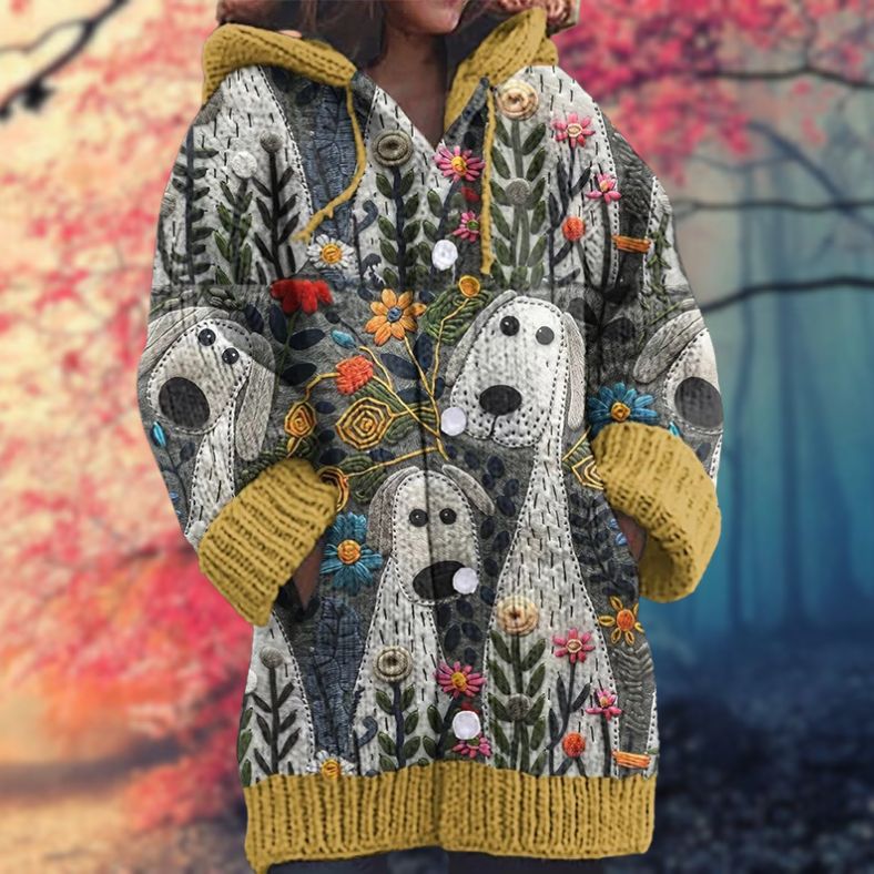Annelie | Warm women's sweater with buttons and a hood.