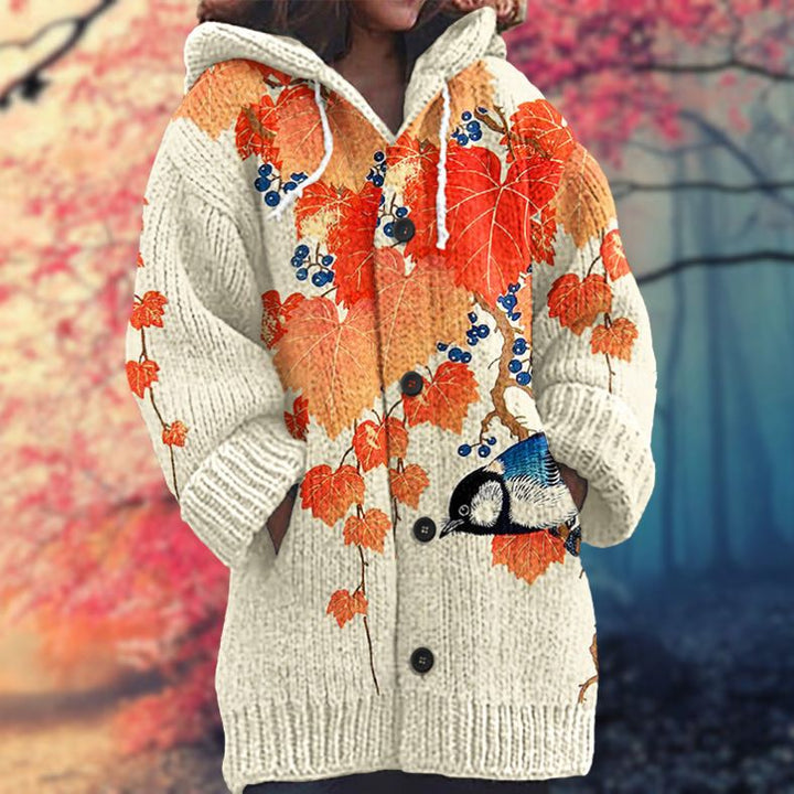 Annelie | Warm women's sweater with buttons and a hood.