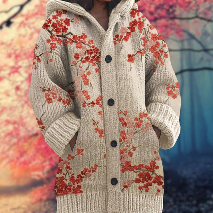 Annelie | Warm women's sweater with buttons and a hood.