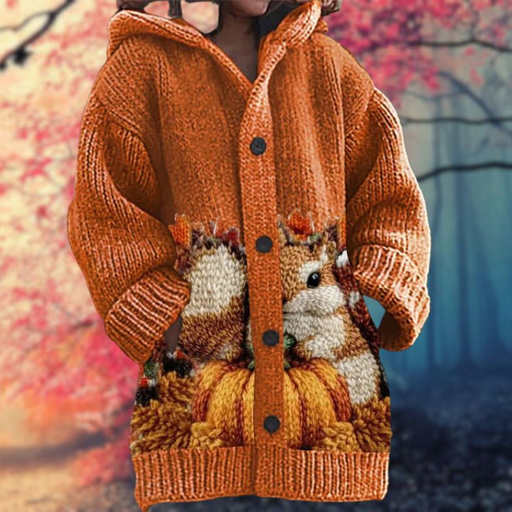 Annelie | Warm women's sweater with buttons and a hood.