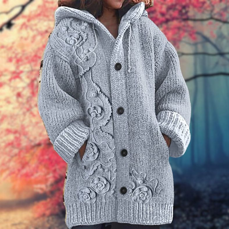 Annelie | Warm women's sweater with buttons and a hood.